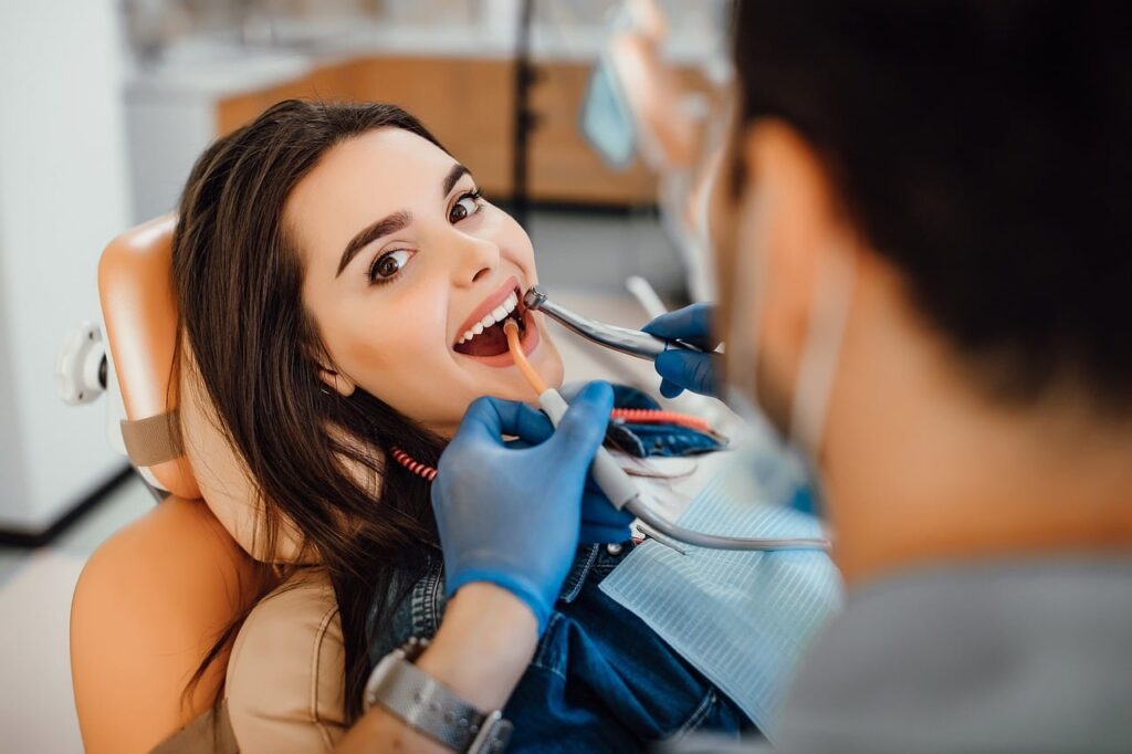 adult, bearded, beautiful, blue, caucasian, check, clean, clinic, dental, dental technician, dental tools, dentist, dentistry, doctor, equipment, expertise, face, female, gloves, healthcare, hospital, hygiene, instrument, man, medical